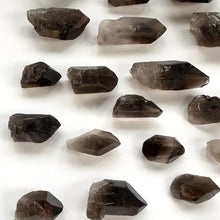 Load and play video in Gallery viewer, Raw Smoky Quartz Points - Bulk - 25-50mm
